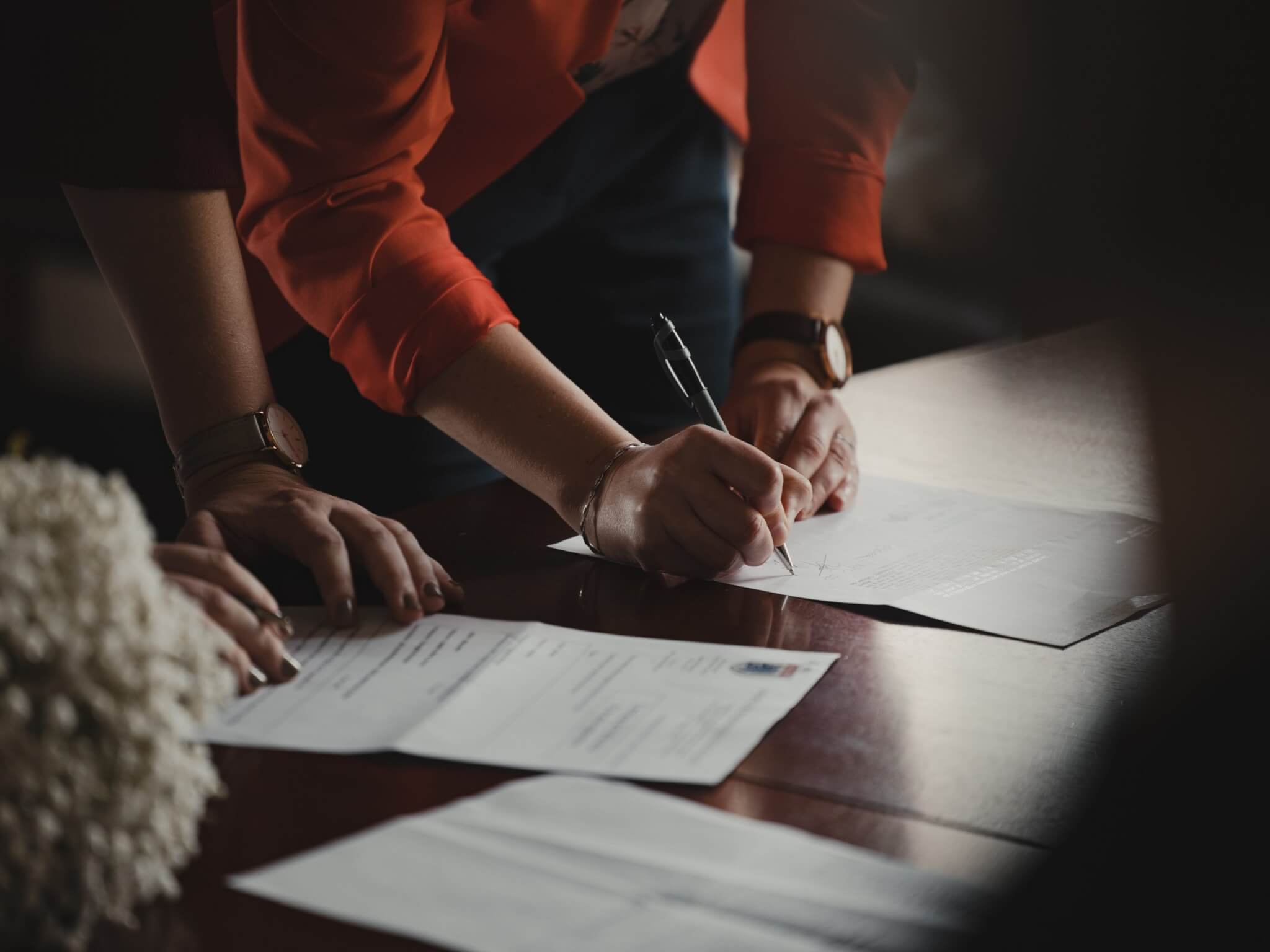 Women Signing Contract