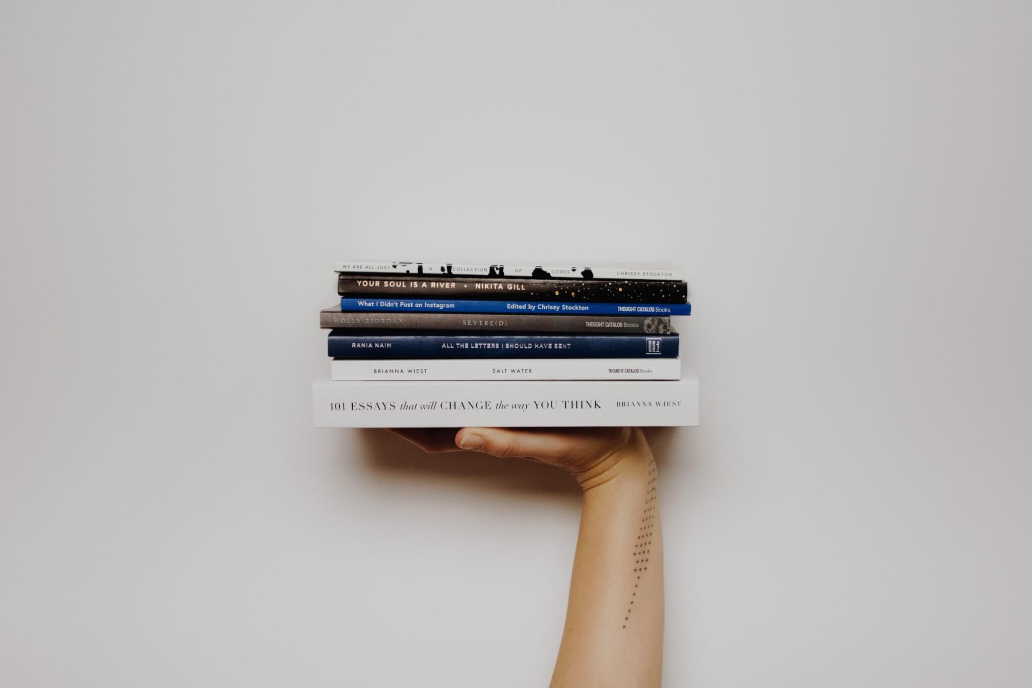 Hand Holding Books