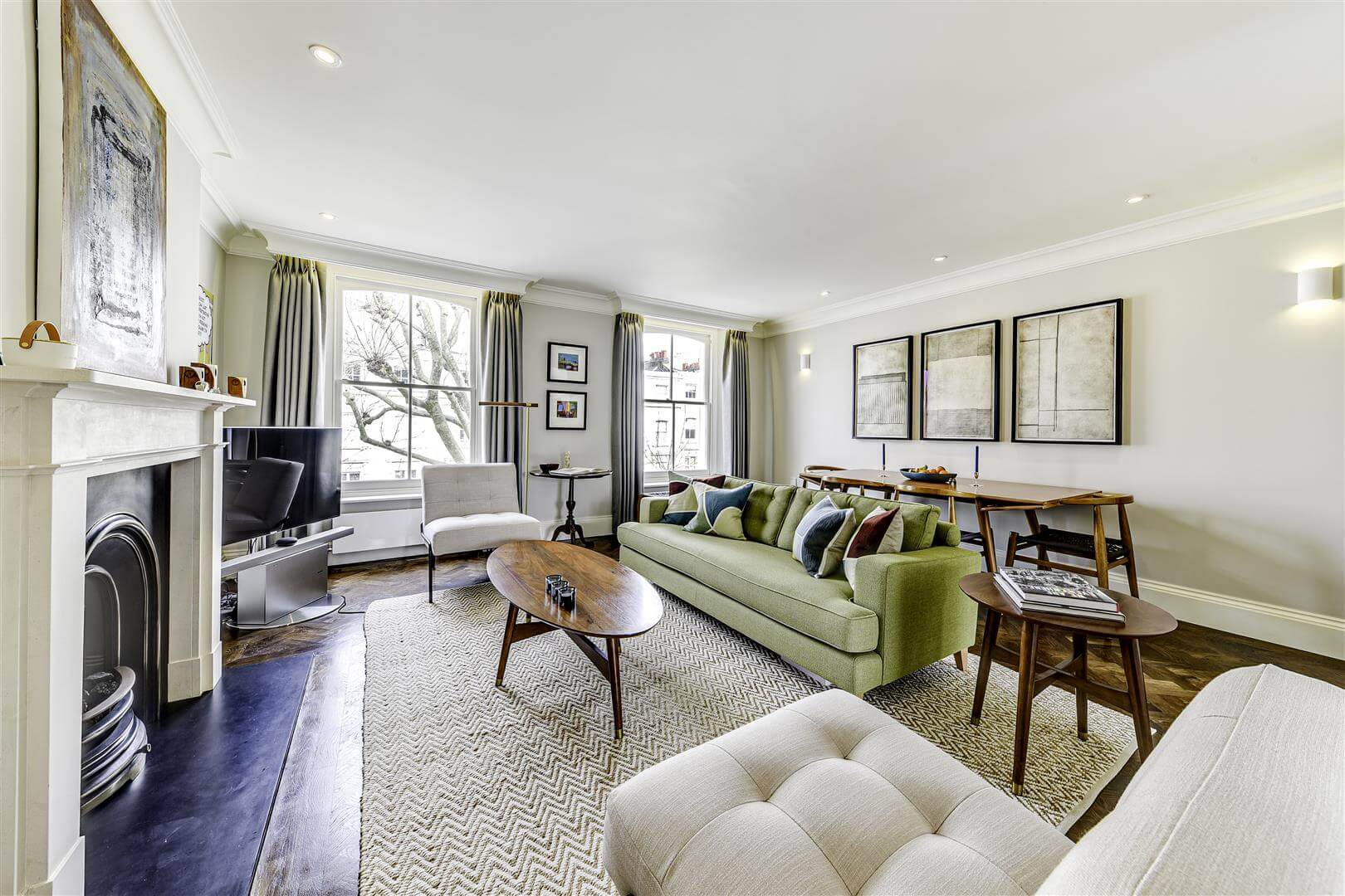 Green Sofa Opposite Fire Place